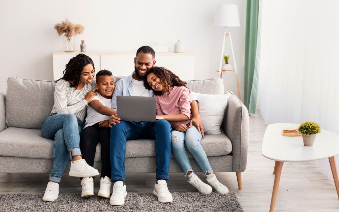A family enjoys screen time.